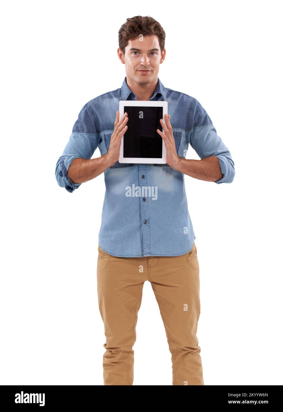 You could be on this screen. A casual young man holding up his digital tablet. Stock Photo