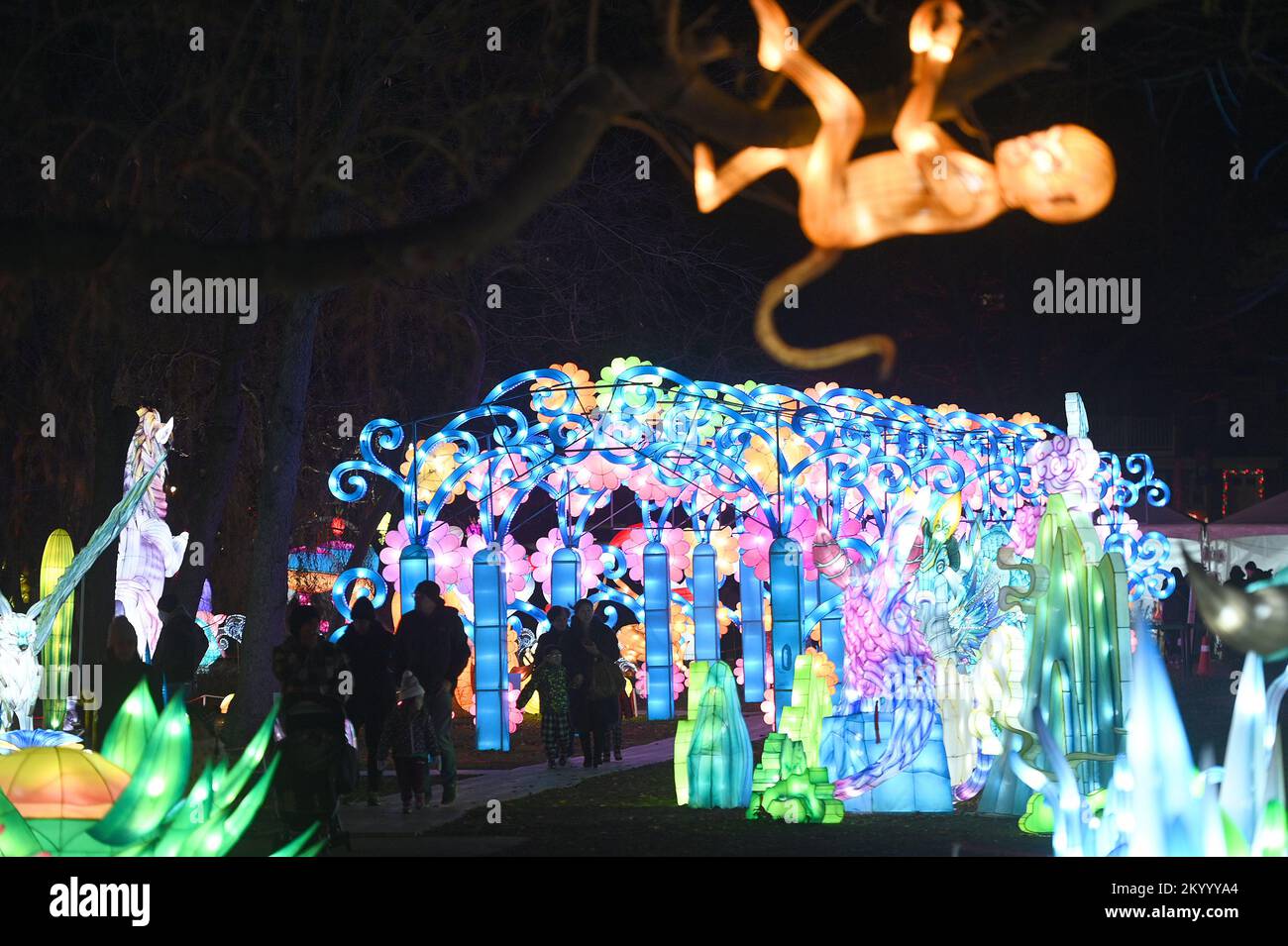 New York, USA. 02nd Dec, 2022. People look at illuminated lantern sculptures as they attend the