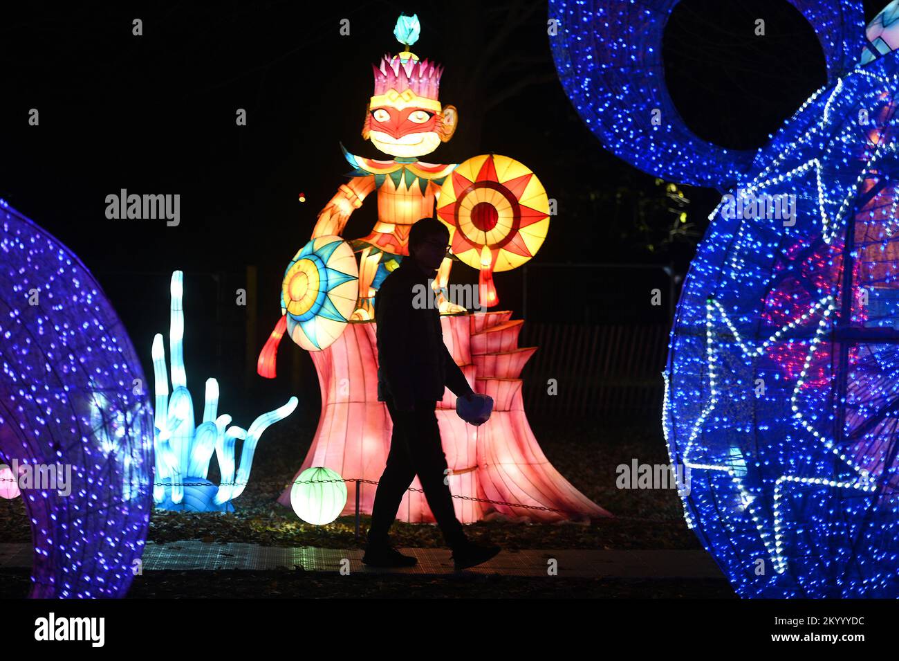 New York, USA . 02nd Dec, 2022. People look at illuminated lantern sculptures as they attend the