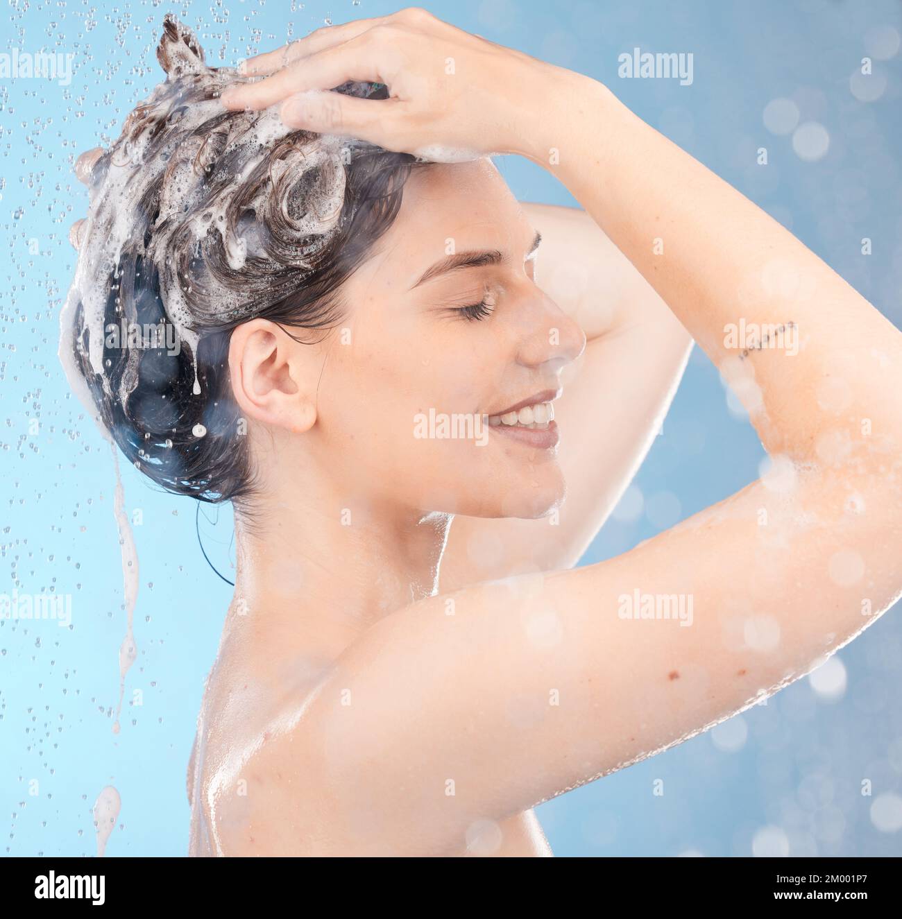 Smiling young girl bathing under a shower at home. Beautiful teen girl  taking shower and washing in the bathroom. Happy child washing head, face  and body with water. Stock Video
