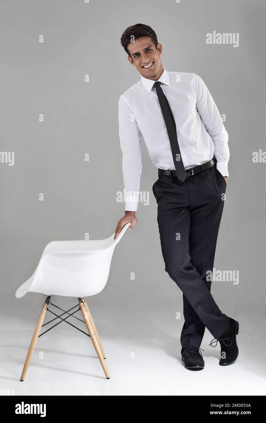 Charming and confident. Full length shot of a charming man in a shirt and tie. Stock Photo