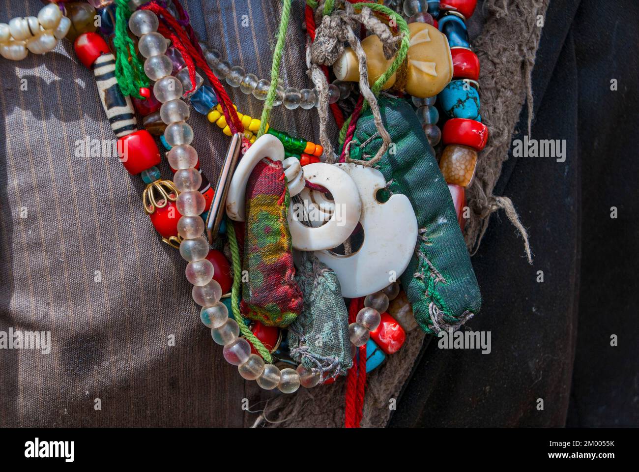 Close up of tibetan jewellery, along the road from Tsochen to Lhasa, Western Tibet, Asia Stock Photo