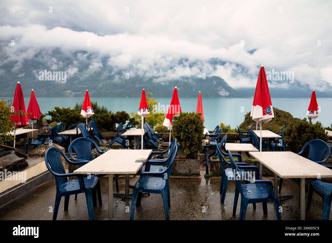 Empty restaurant, café, bad weather on the lake promenade at Lake Brienz, Brienz, Canton Bern, Bernese Oberland, Switzerland, Europe Stock Photo