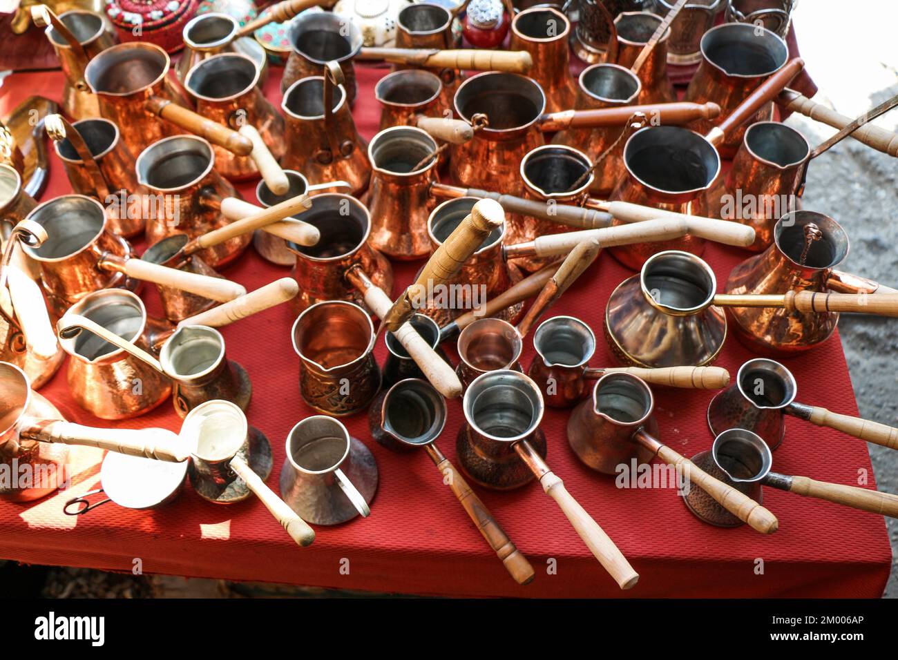 Selling old metal cookware in bazaar Stock Photo Alamy