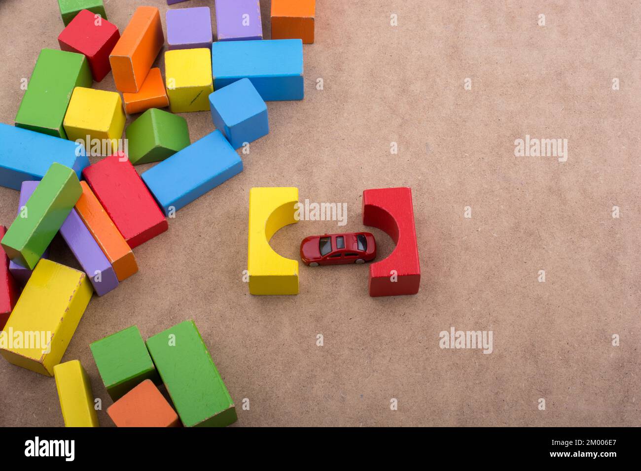 Building blocks and a toy car as a transportation devices Stock Photo