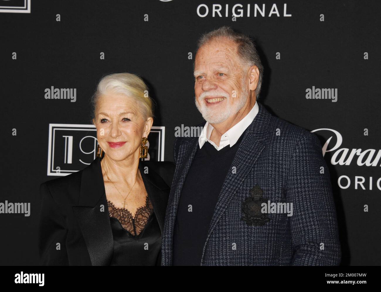 LOS ANGELES, CALIFORNIA - DECEMBER 02: (L-R) Helen Mirren and Taylor Hackford attend the Los Angeles Premiere Of Paramount+'s '1923' at Hollywood Amer Stock Photo