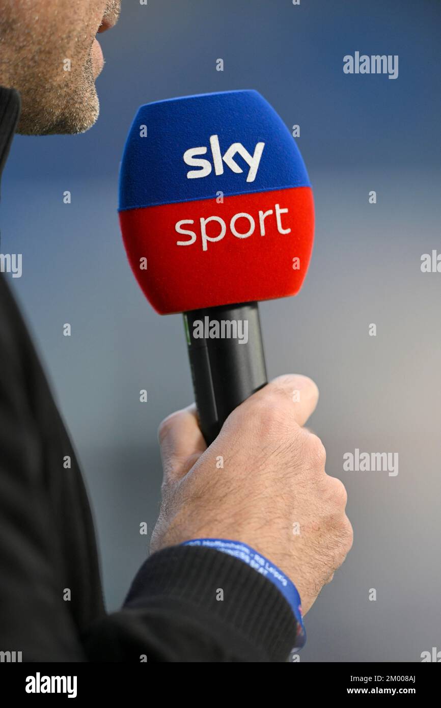 Hand holding microphone, SKY logo, PreZero Arena, Sinsheim, Baden-Württemberg, Germany, Europe Stock Photo