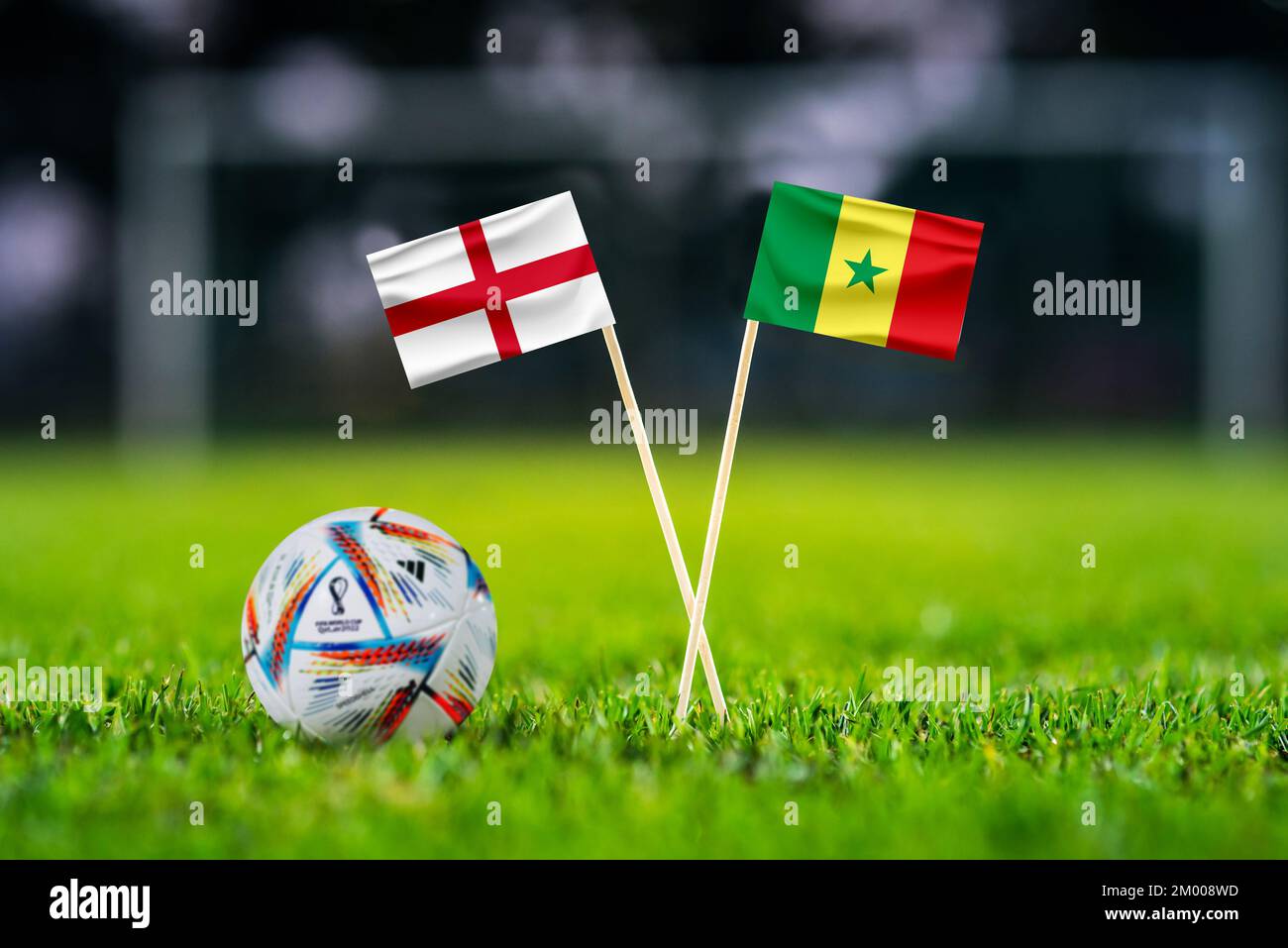 QATAR, DOHA, NOVEMBER 29. 2022: England - Senegal. Eight final, Last 16 football match. Official ball of Fifa world cup Qatar 2022 on green grass. Soc Stock Photo