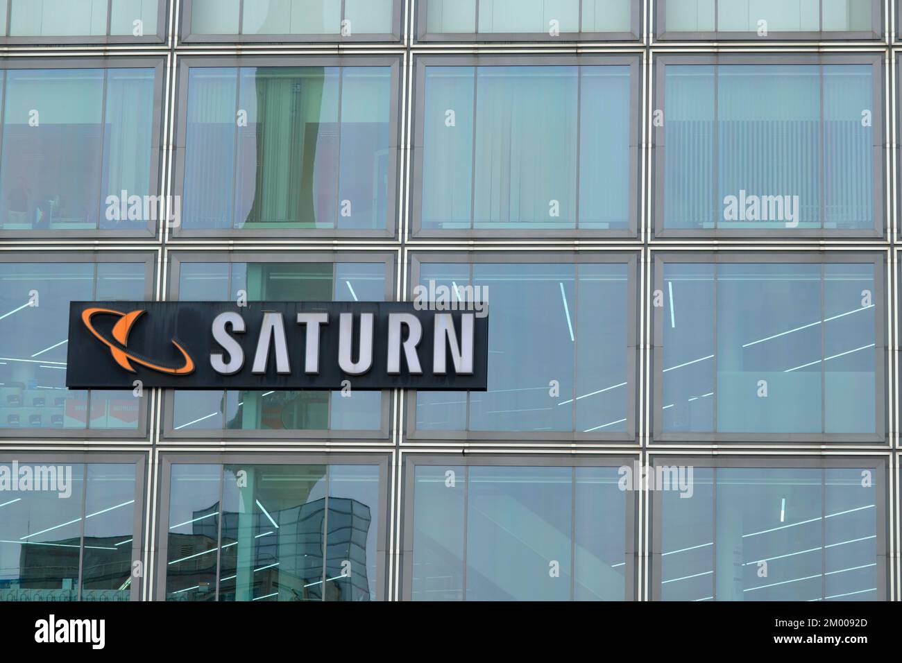 Glass façade with Saturn logo, Alexanderplatz, Berlin, Germany, Europe Stock Photo