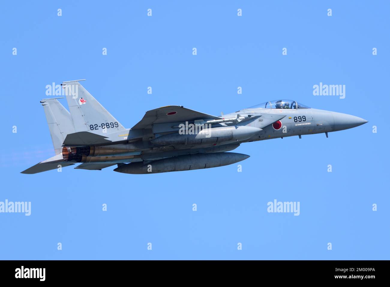 Fukuoka Prefecture, Japan - April 14, 2014: Japan Air Self-Defense Force Boeing F-15J Eagle scrambling with full afterburners. Stock Photo