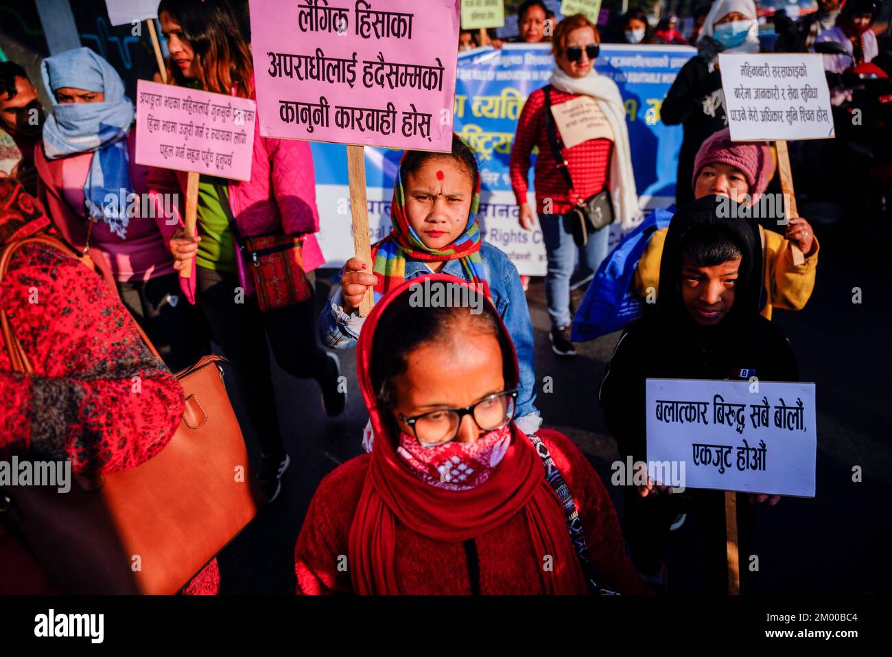 Differently abled people hold placards during a rally held to mark the International Day of Persons with Disabilities in Kathmandu. Stock Photo