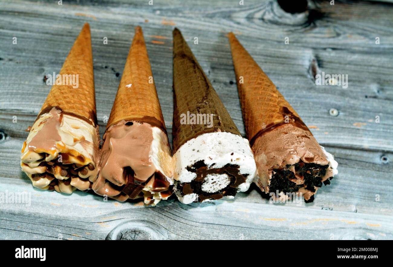 Collection of different types of Ice cream cones of cocoa chocolate and
