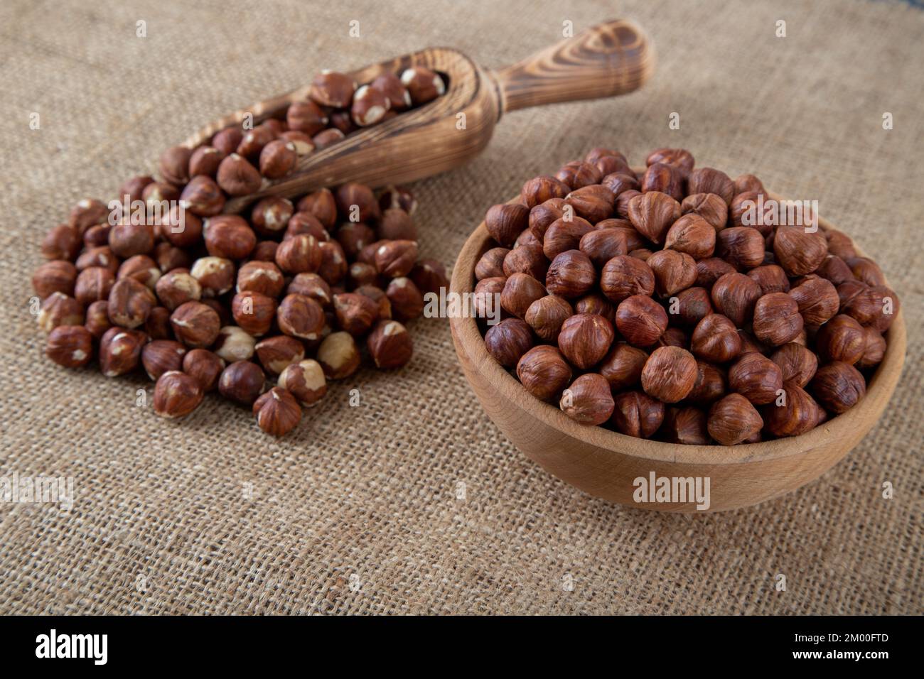 Top view of a bowl full of hazelnuts Stock Photo