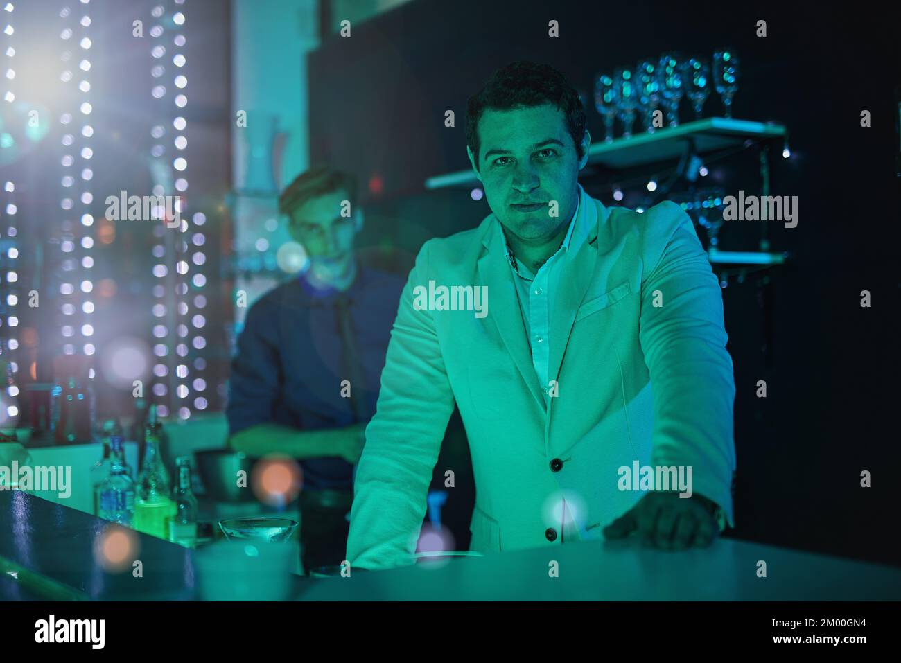 Club, drink and portrait of a bartender working at a party, happy hour