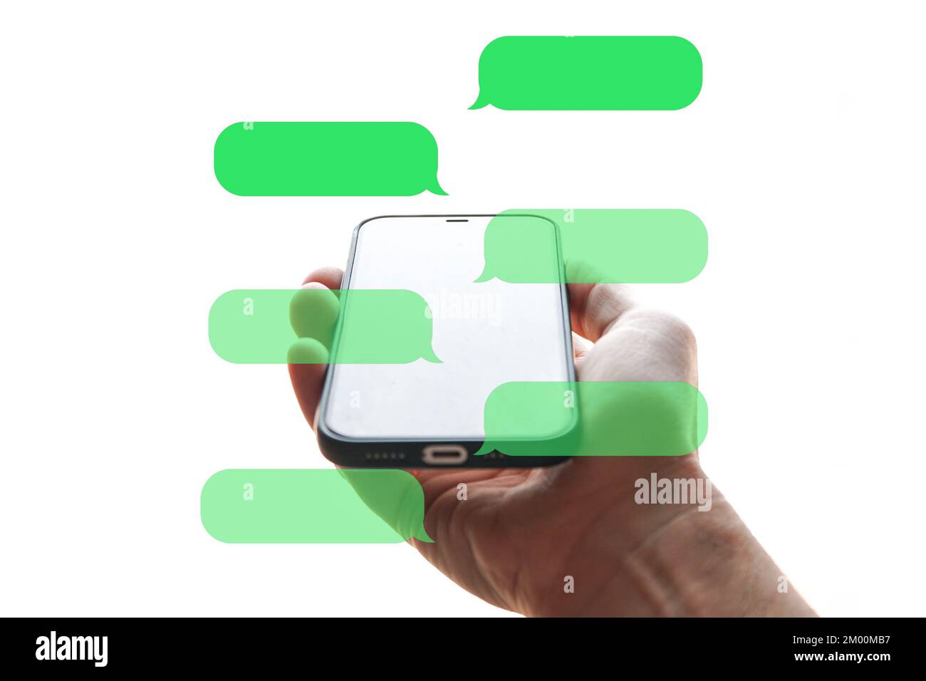 hand holding a smartphone with chat symbol, texting on the phone, phone addiction Stock Photo