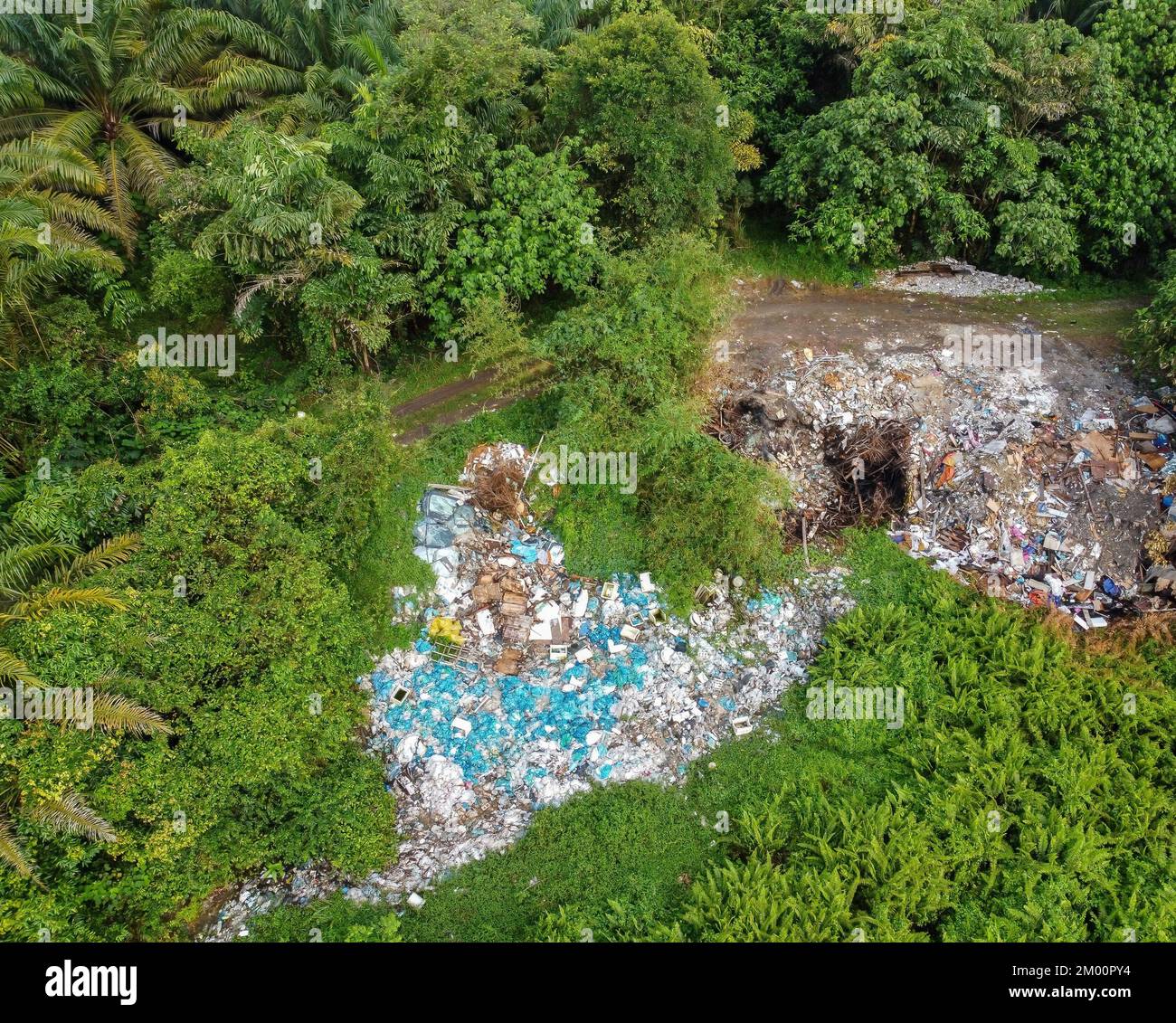 Aerial top down view illegal rubbish dump site at rural area Stock