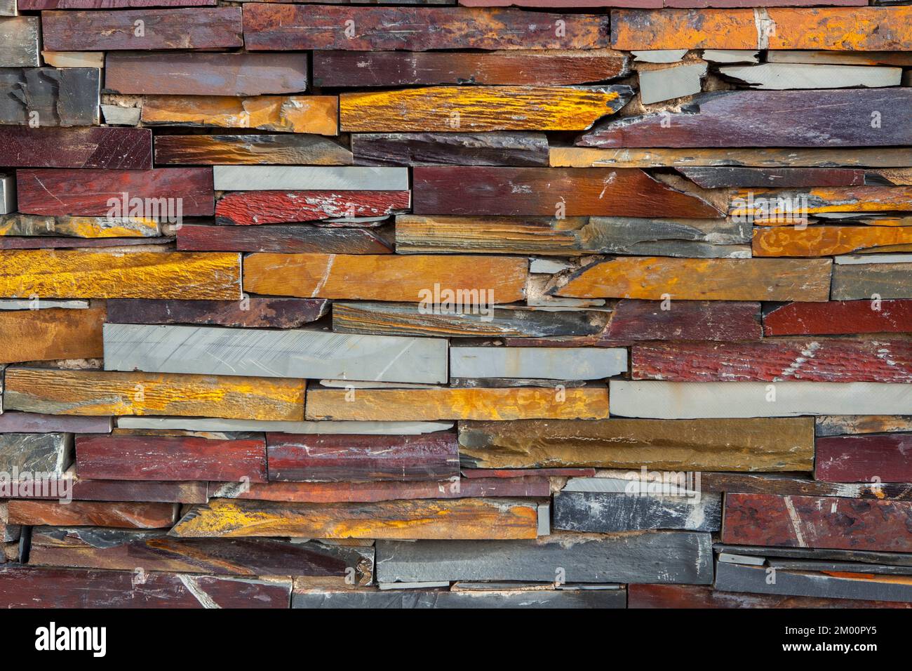 Natural colorful rust slate wall. Thick Slabs. Stock Photo