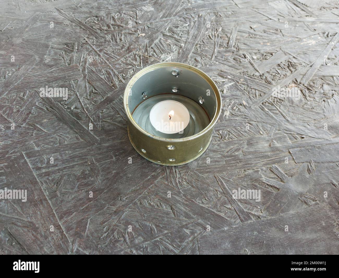 Can fire burner and the survival candle Stock Photo Alamy