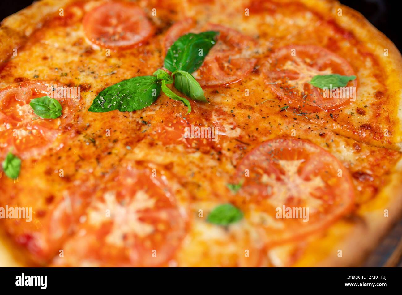 Italian pizza. An appetizing pizza with vegetarian topping. Stock Photo