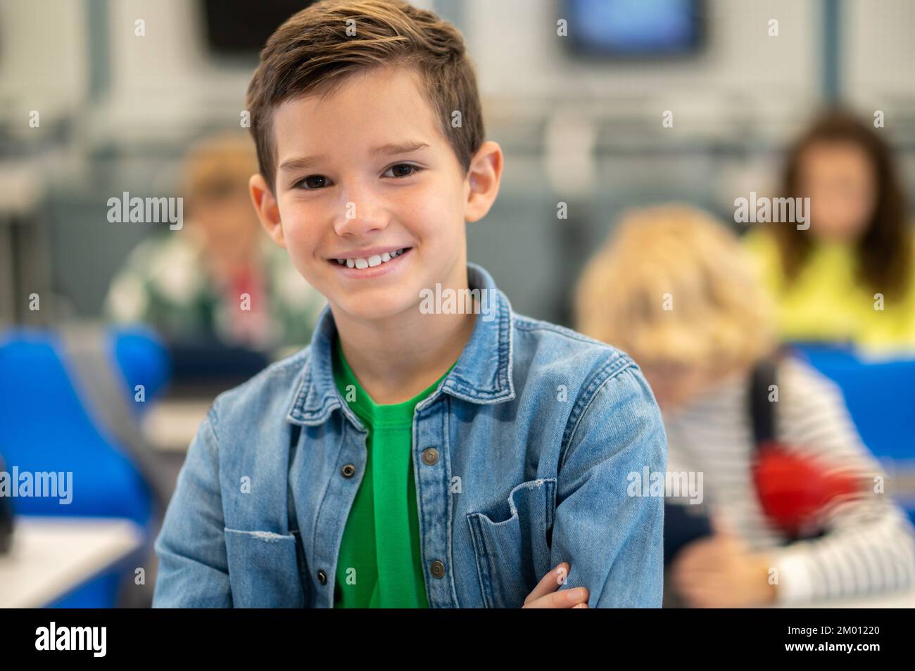 Good Moments Boy Of Primary School Age Smiling Confidently At Camera