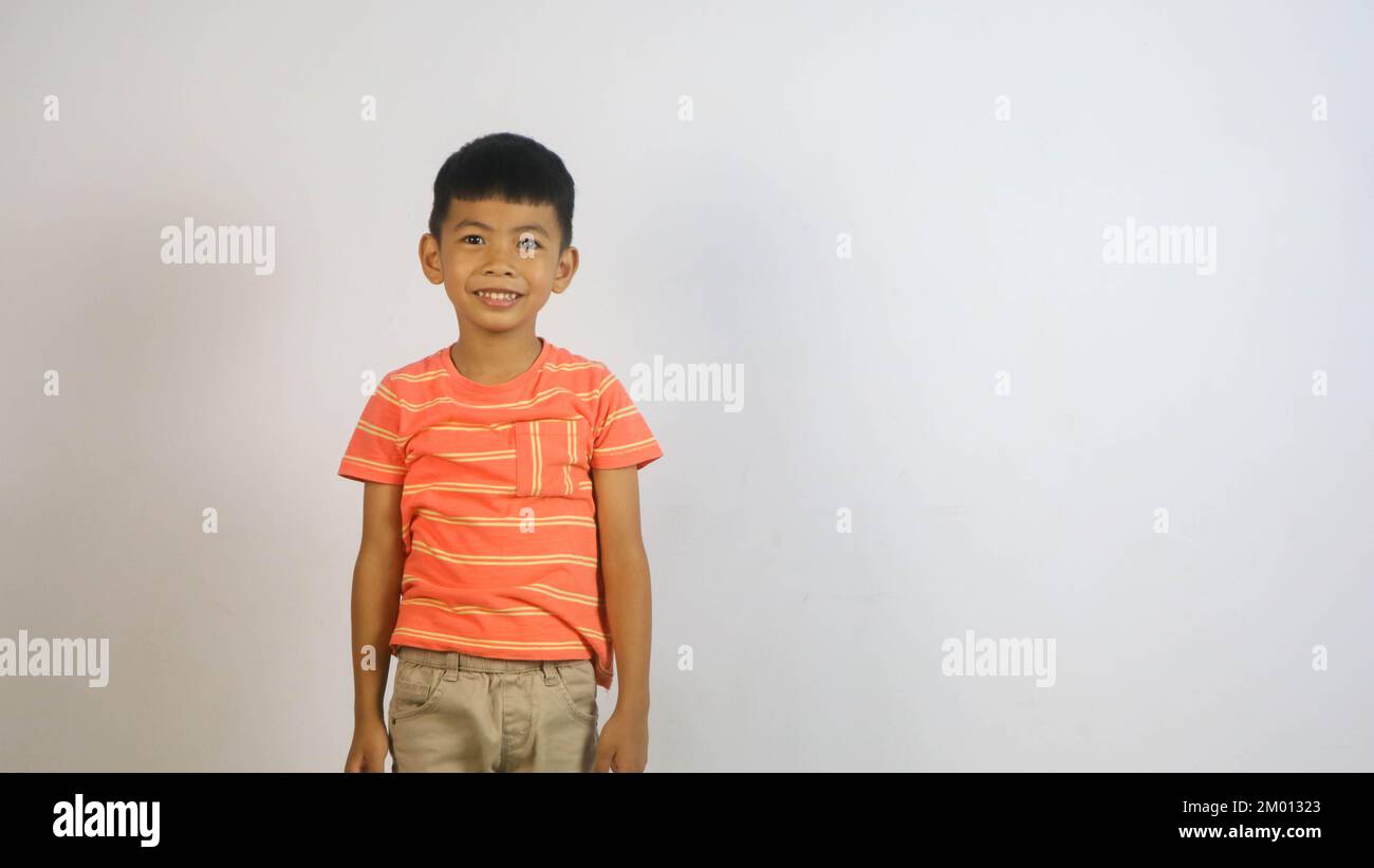 Cute Asian boy isolated on white background Stock Photo - Alamy
