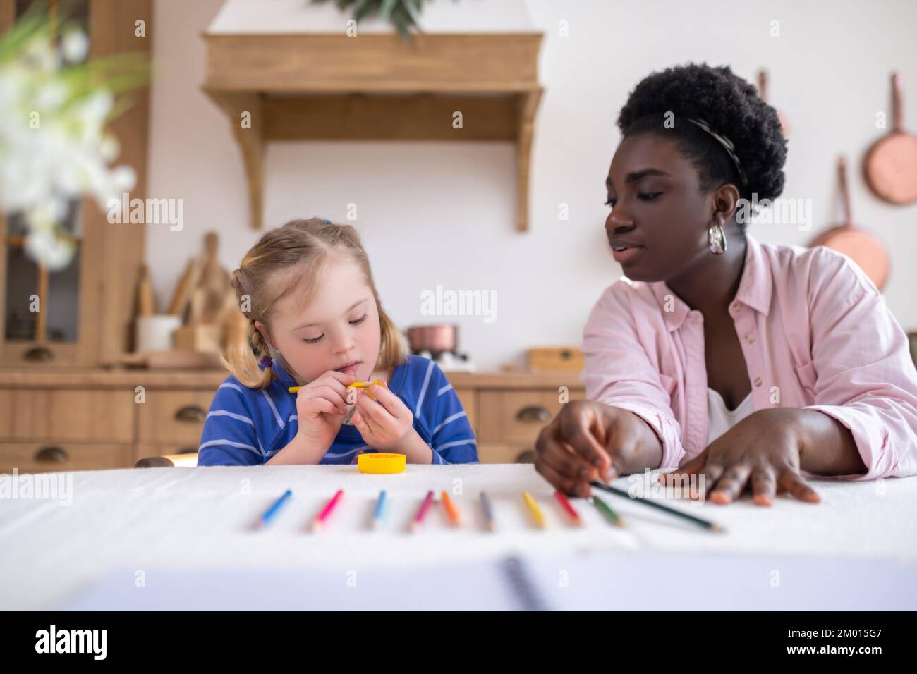 Markers And An Open Blank Drawing Pad Bright Colored Pencils Are Lying On  The Table Next To Him Childrens Creativity Hobbies School And Preschool  Education Drawing Lessons Back To School High-Res Stock