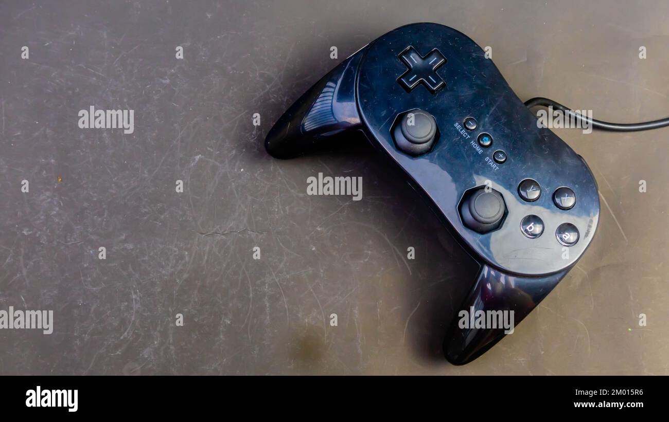 black joystick isolated on black background Stock Photo - Alamy