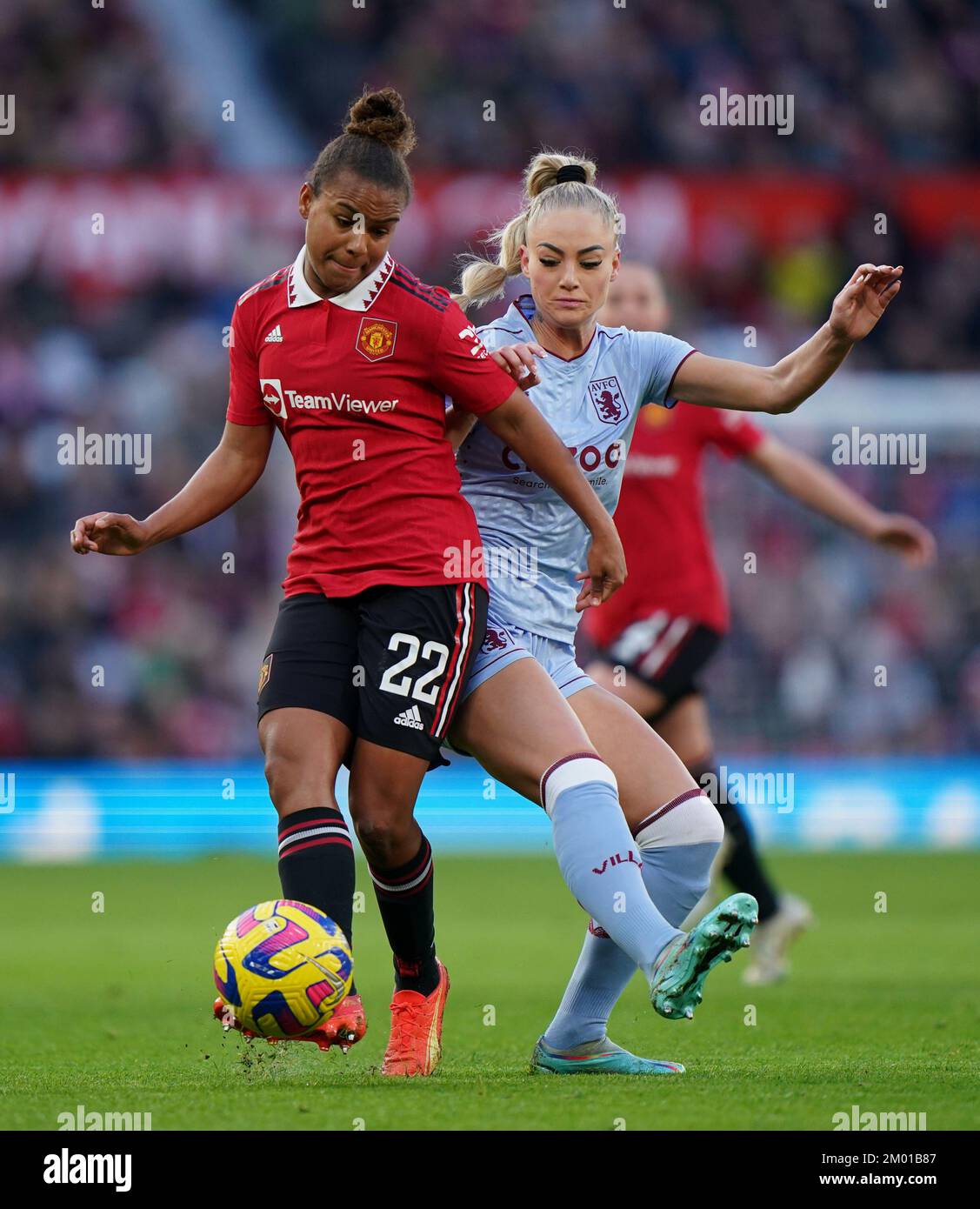 Manchester United's Nikita Parris (left) and Aston Villa's Alisha Lehmann battle for the ball during the Barclays Women's Super League match at Old Trafford, Manchester. Picture date: Saturday December 3, 2022. Stock Photo