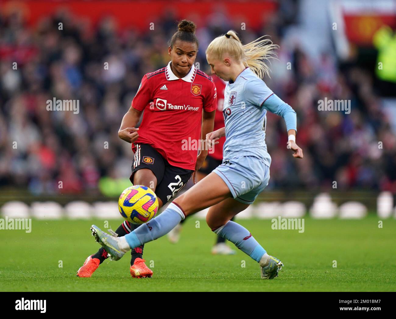 Manchester United's Nikita Parris (left) and Aston Villa's Laura Blindkilde battle for the ball during the Barclays Women's Super League match at Old Trafford, Manchester. Picture date: Saturday December 3, 2022. Stock Photo