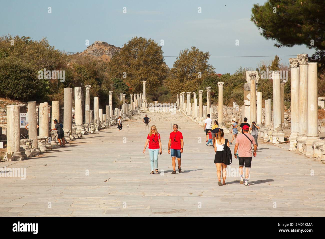 Tourists on the Arcadian Way-Harbor Street at the Roman ruins of Ephesus, Efes, Selcuk, Kusadasi,Turkey, Europe. Stock Photo