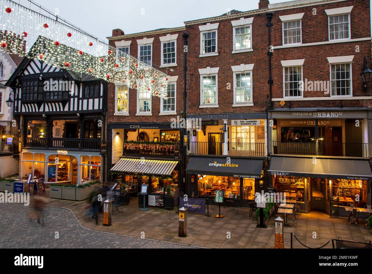 Chester, United Kingdom - November 30th, 2022: Christmas lights decorate old town of Chester Stock Photo