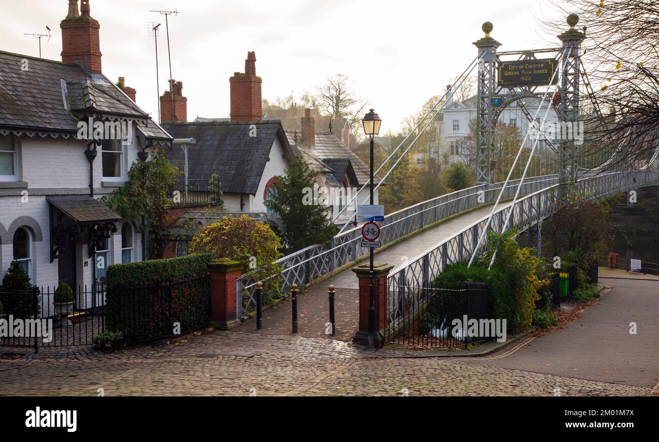 Chester, United Kingdom - November 30th, 2022:The Queens Park Bridge is a suspension bridge that spans the  River Dee, it is the work of civic enginee Stock Photo