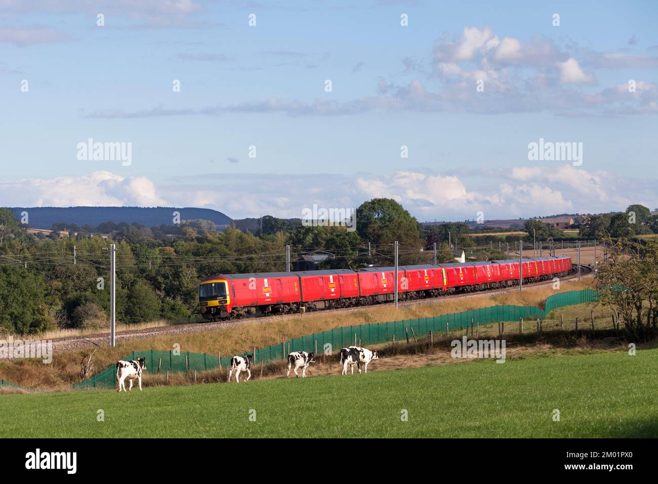 Royal Mail class 325 freight multiple units on the west coast mainline in Cumbria with Shieldmuir to Warrington mail train working Stock Photo