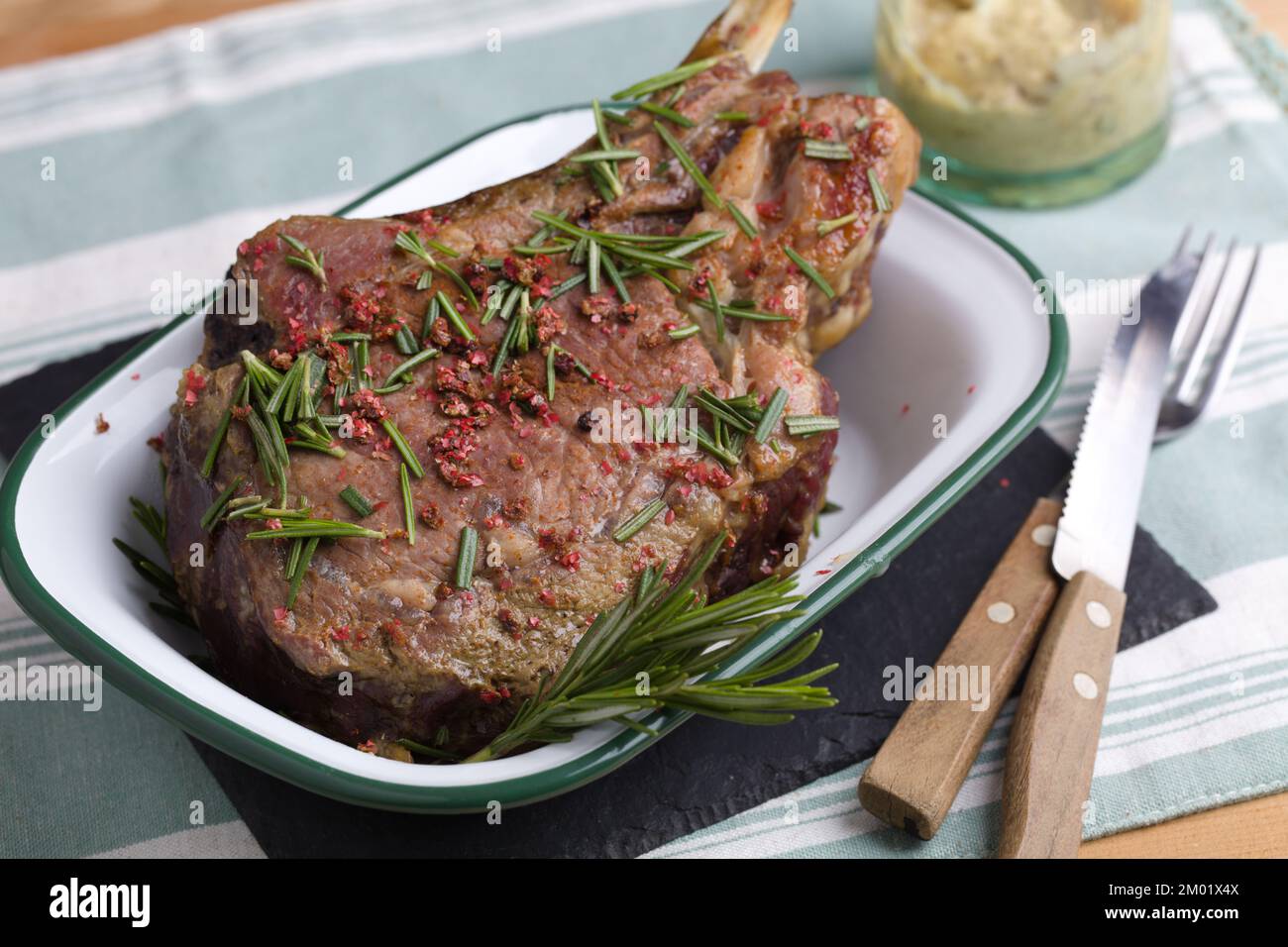 Rib eye steak with mustard sauce and rosemary Stock Photo Alamy