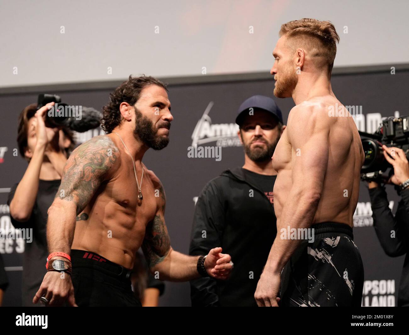 Orlando, Fl, United States. 02nd Dec, 2022. Amway Center ORLANDO, FL - December 2: Scott Holtzman (R) and Clay Guida (L) Face-off following the ceremonial weigh-in at Amway Center for UFC Orlando - Thompson vs Holland on December 2, 2022 in ORLANDO, FL, United States. (Photo by Louis Grasse/PxImages) (Louis Grasse/SPP) Credit: SPP Sport Press Photo. /Alamy Live News Stock Photo