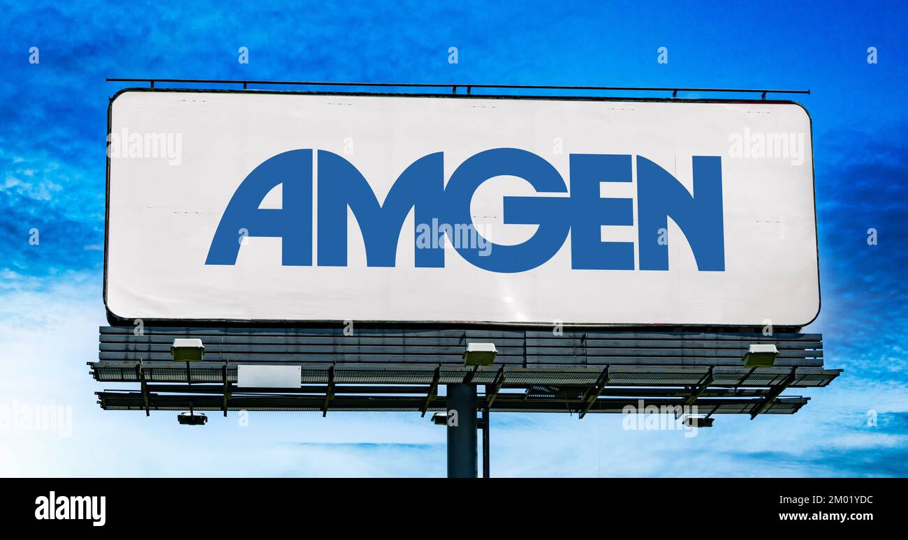 POZNAN, POL - OCT 28, 2022: Advertisement billboard displaying logo of Amgen, a biopharmaceutical company headquartered in Thousand Oaks, California Stock Photo