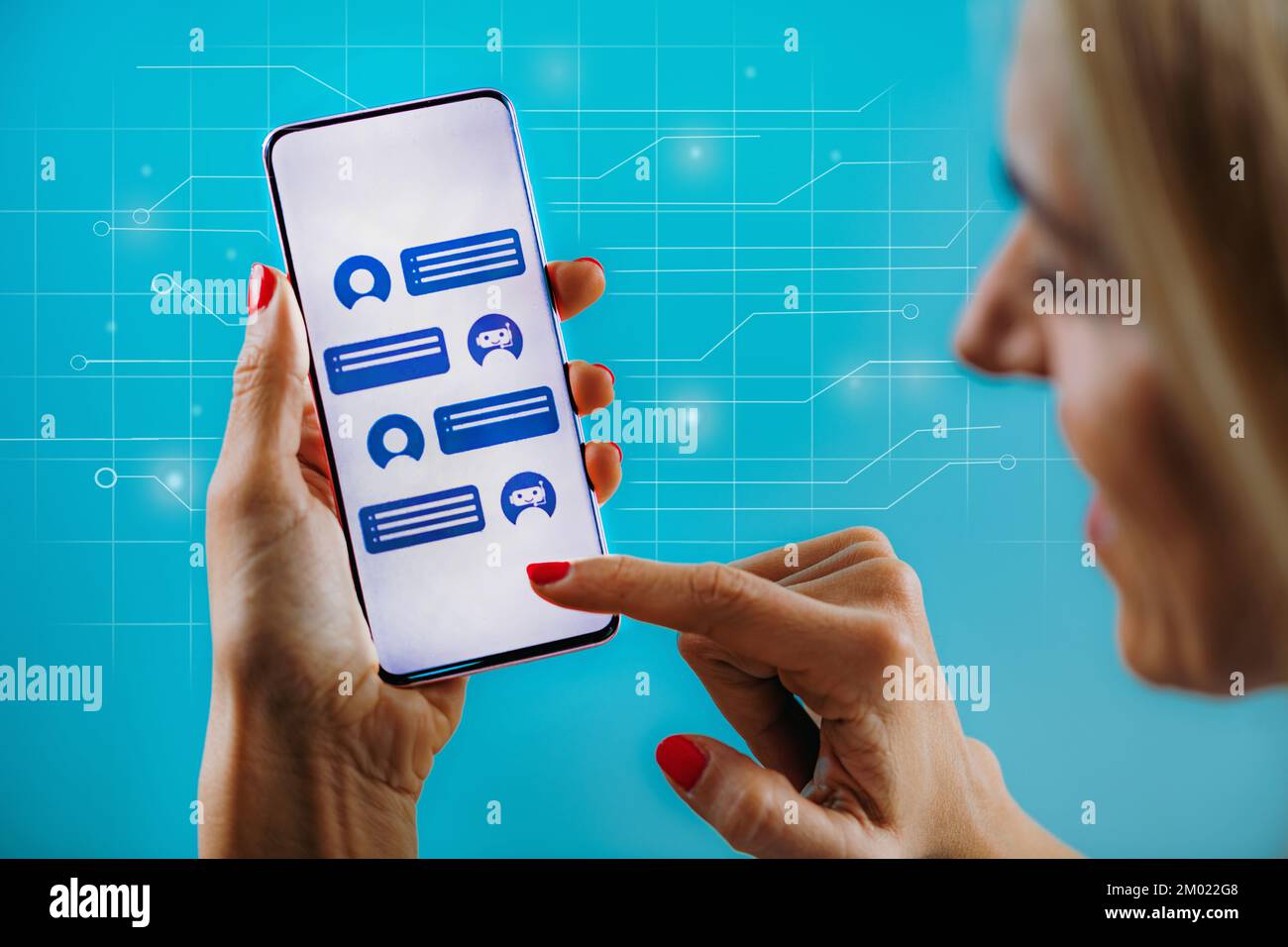 Customer using a chatbot on a smartphone. Stock Photo