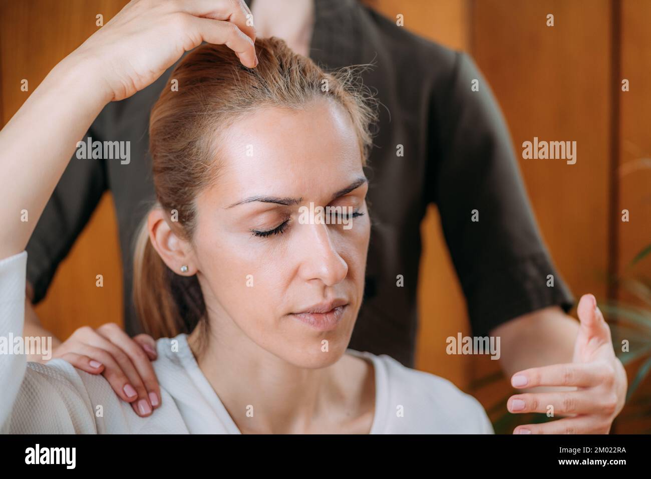 Tapping technique for chakra clearance and balance. Stock Photo