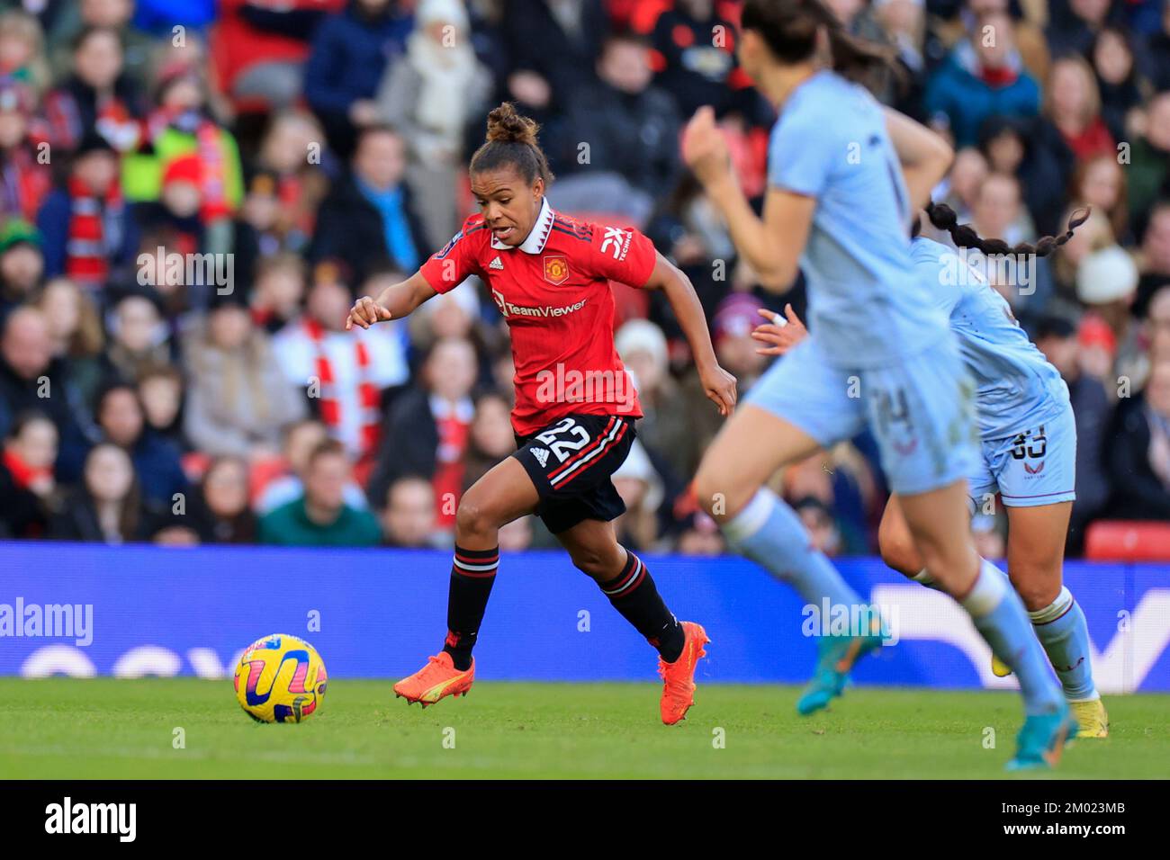 Nikita Parris #22 of Manchester United runs with the ball during The FA Women's Super League match Manchester United Women vs Aston Villa Women at Old Trafford, Manchester, United Kingdom, 3rd December 2022  (Photo by Conor Molloy/News Images) Stock Photo