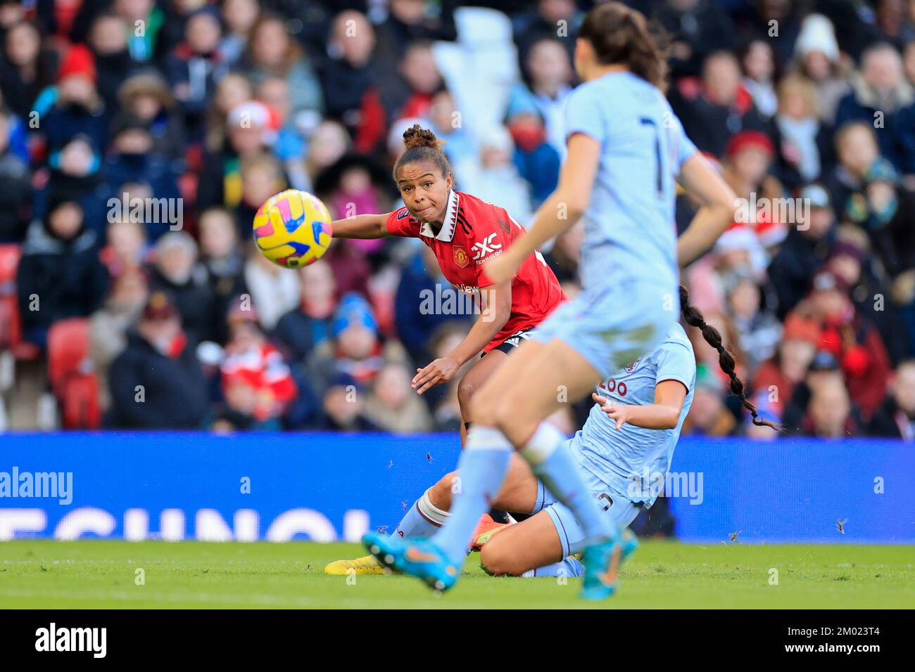 Nikita Parris #22 of Manchester United crosses with the ball during The FA Women's Super League match Manchester United Women vs Aston Villa Women at Old Trafford, Manchester, United Kingdom, 3rd December 2022  (Photo by Conor Molloy/News Images) Stock Photo