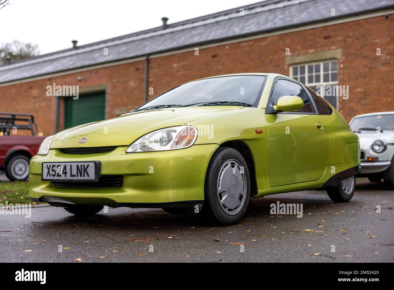 2001 Honda Insight ‘X524 LNK’ on display at the Workhorse Assembly held at the Bicester Heritage Centre on the 27th November 2022 Stock Photo
