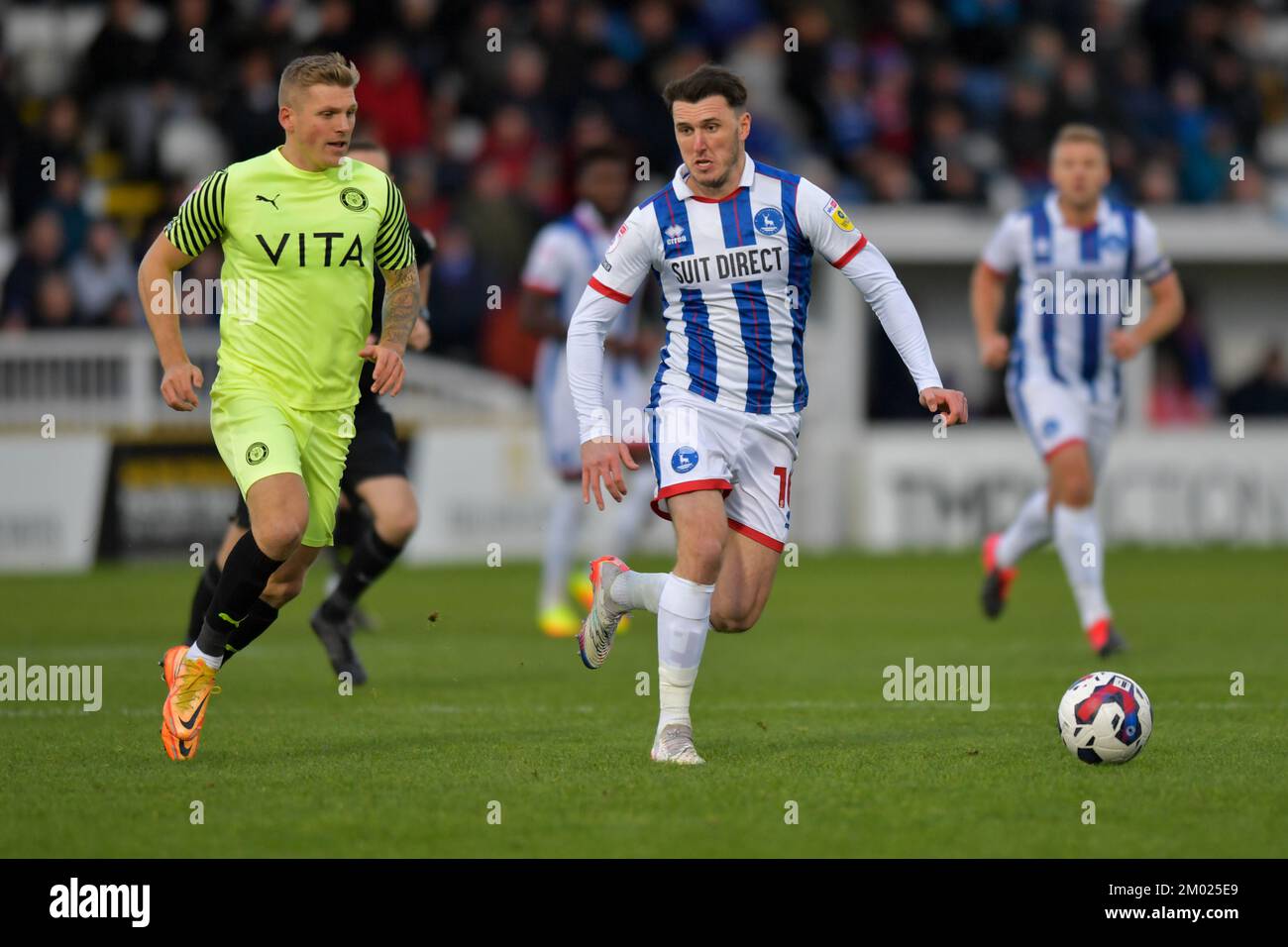 Hartlepool, UK. 3rd December 2022Hartlepool United's Callum Cooke moves away from Stockport County's Will Collar during the Sky Bet League 2 match between Hartlepool United and Stockport County at Victoria Park, Hartlepool on Saturday 3rd December 2022. (Credit: Scott Llewellyn | MI News) Credit: MI News & Sport /Alamy Live News Stock Photo
