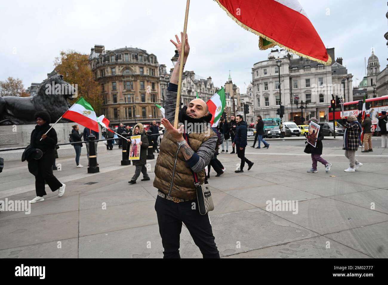 Trafalgar square, London, UK. 3rd December 2022: The People's Mojahedin Organization of Iran (PMOI) demonstration to support Iran's Revolution display a Christmas tree and those been killecd by the Iranian government waving Iran flags. Credit: See Li/Picture Capital/Alamy Live News Stock Photo