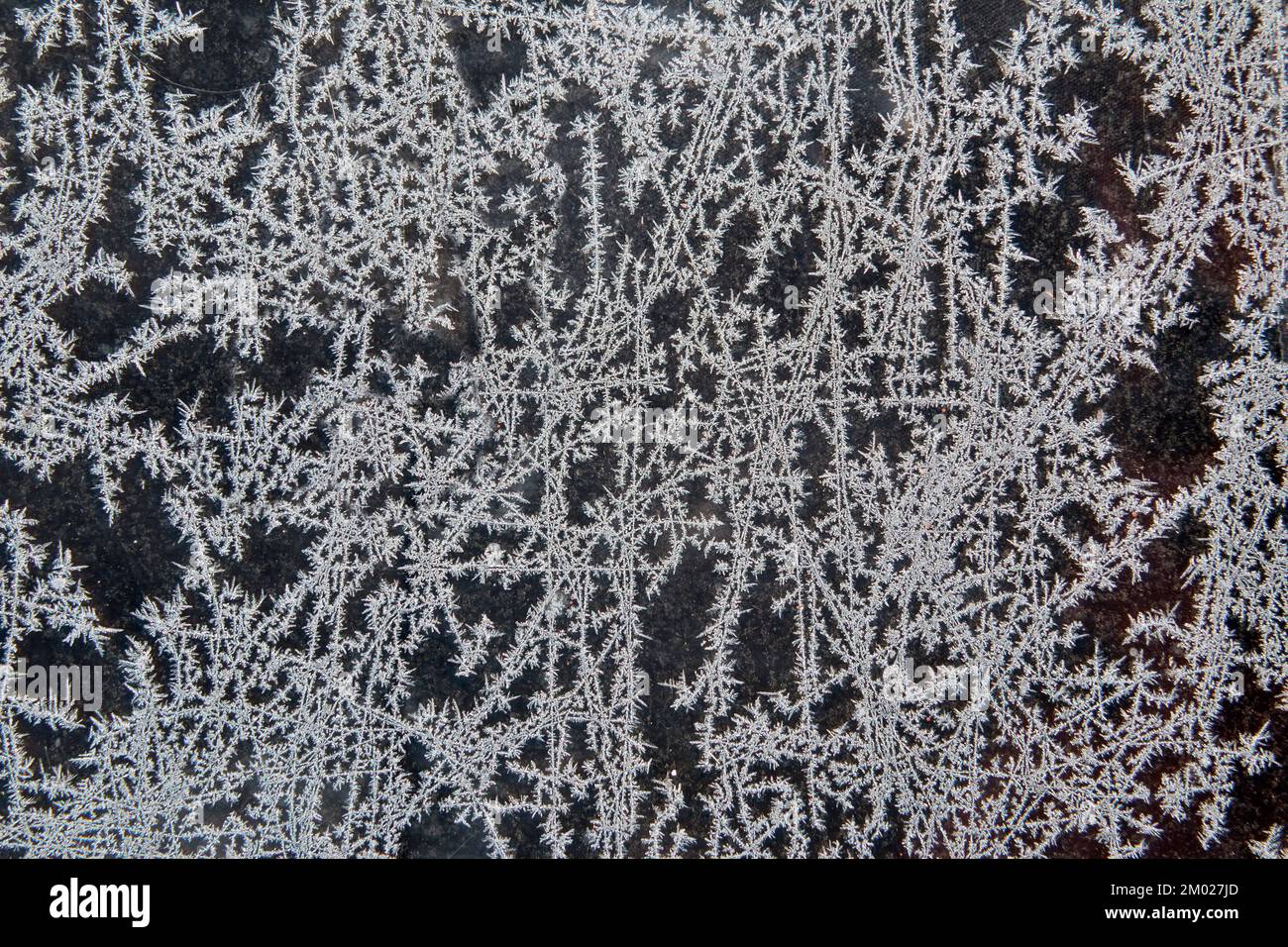 Frost pattern on a window, Can be used as background Stock Photo - Alamy