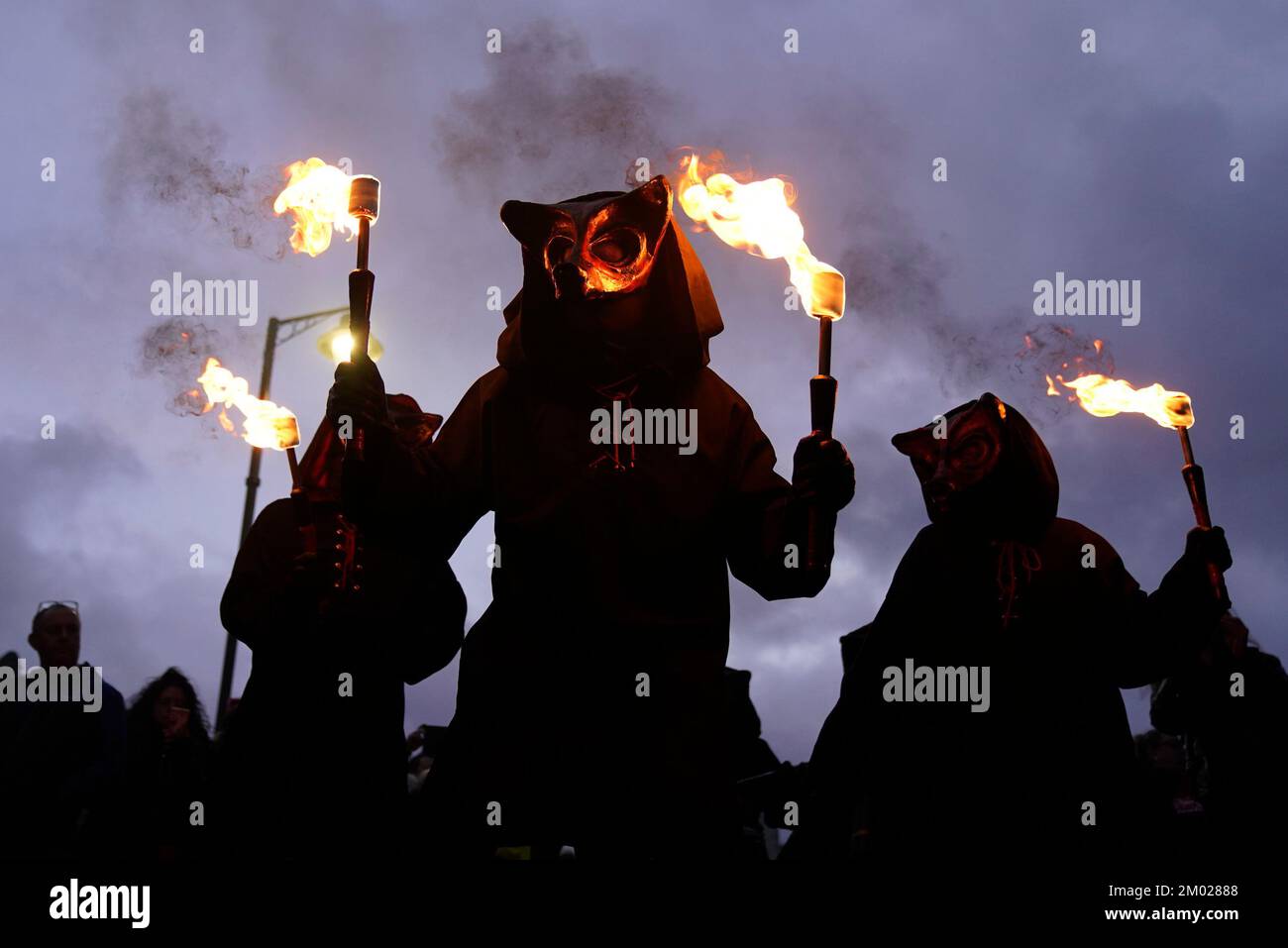 Participants during the Whitby Krampus Run street parade in Whitby ...