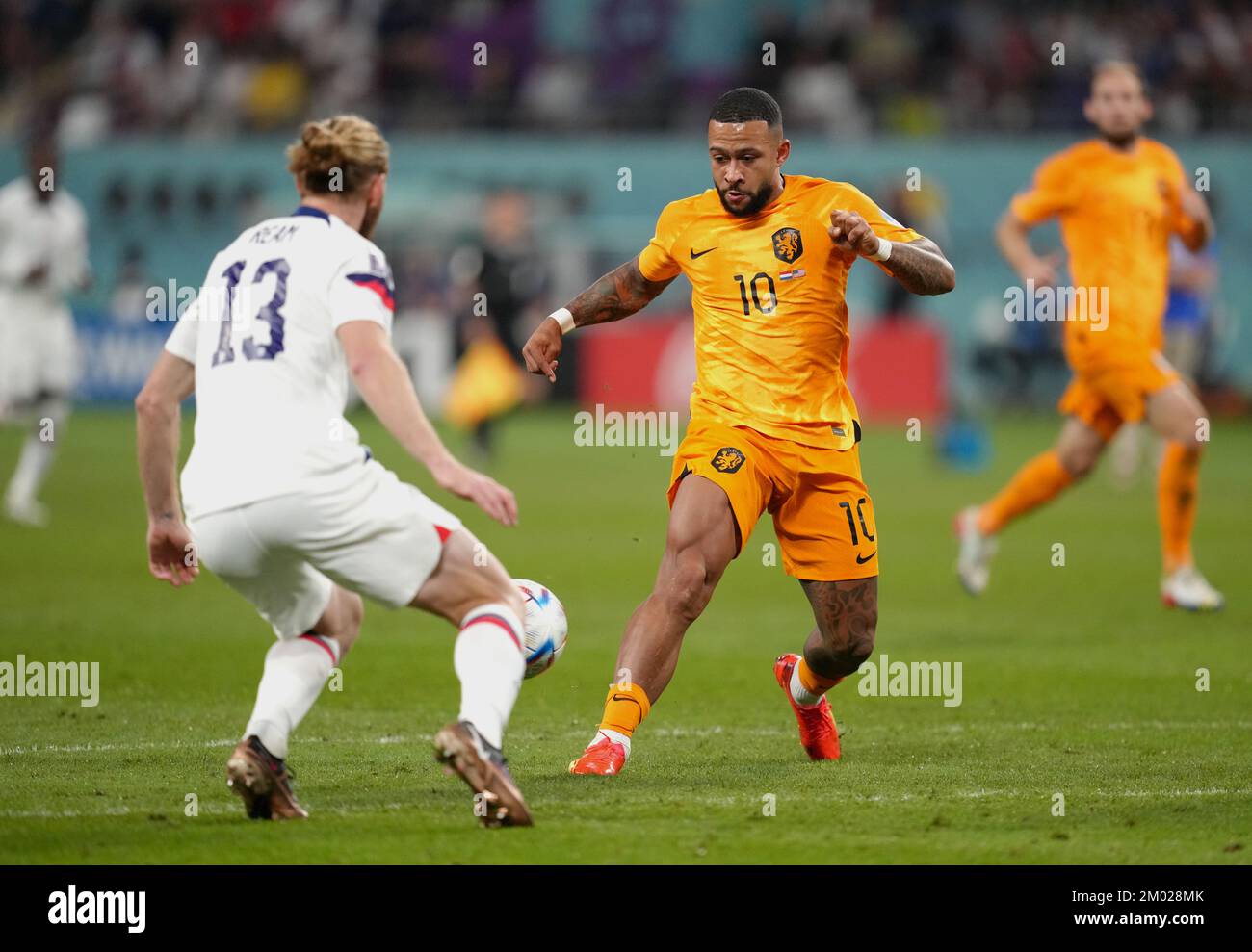 Netherlands' Memphis Depay in action during the FIFA World Cup round of 16 match at the Khalifa International Stadium in Al Rayyan, Qatar. Picture date: Saturday December 3, 2022. Stock Photo