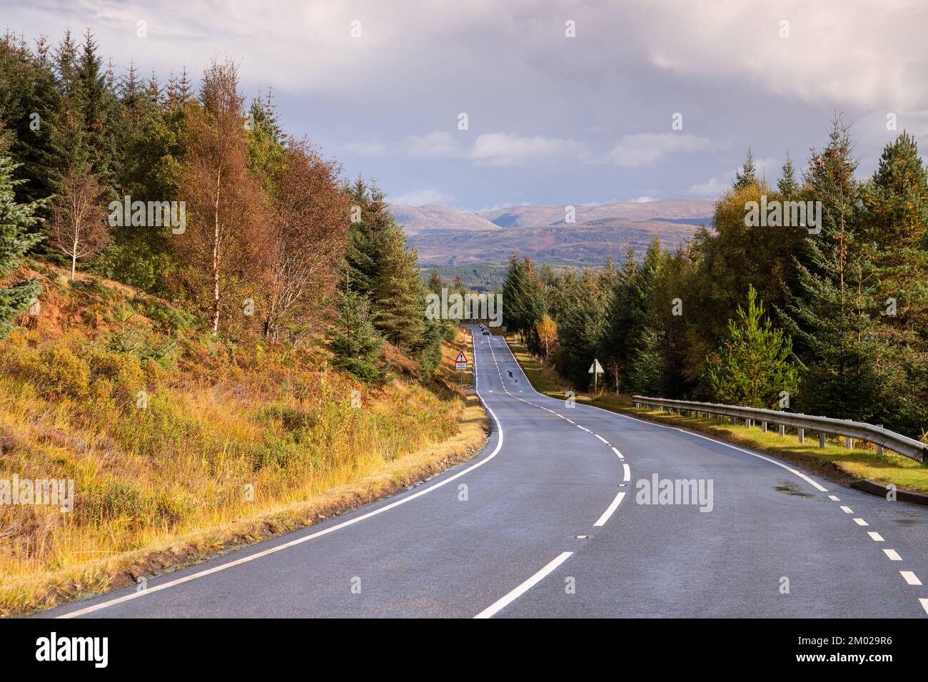 Road through Glengarry in the highlands of Scotland Stock Photo