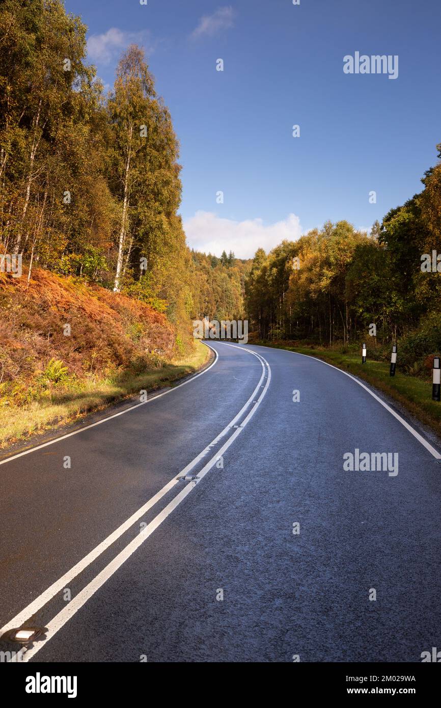 Road through Glengarry in the highlands of Scotland Stock Photo