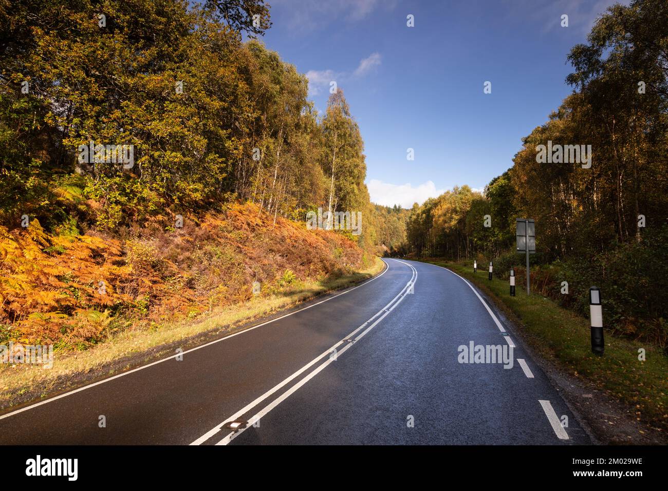 Road through Glengarry in the highlands of Scotland Stock Photo