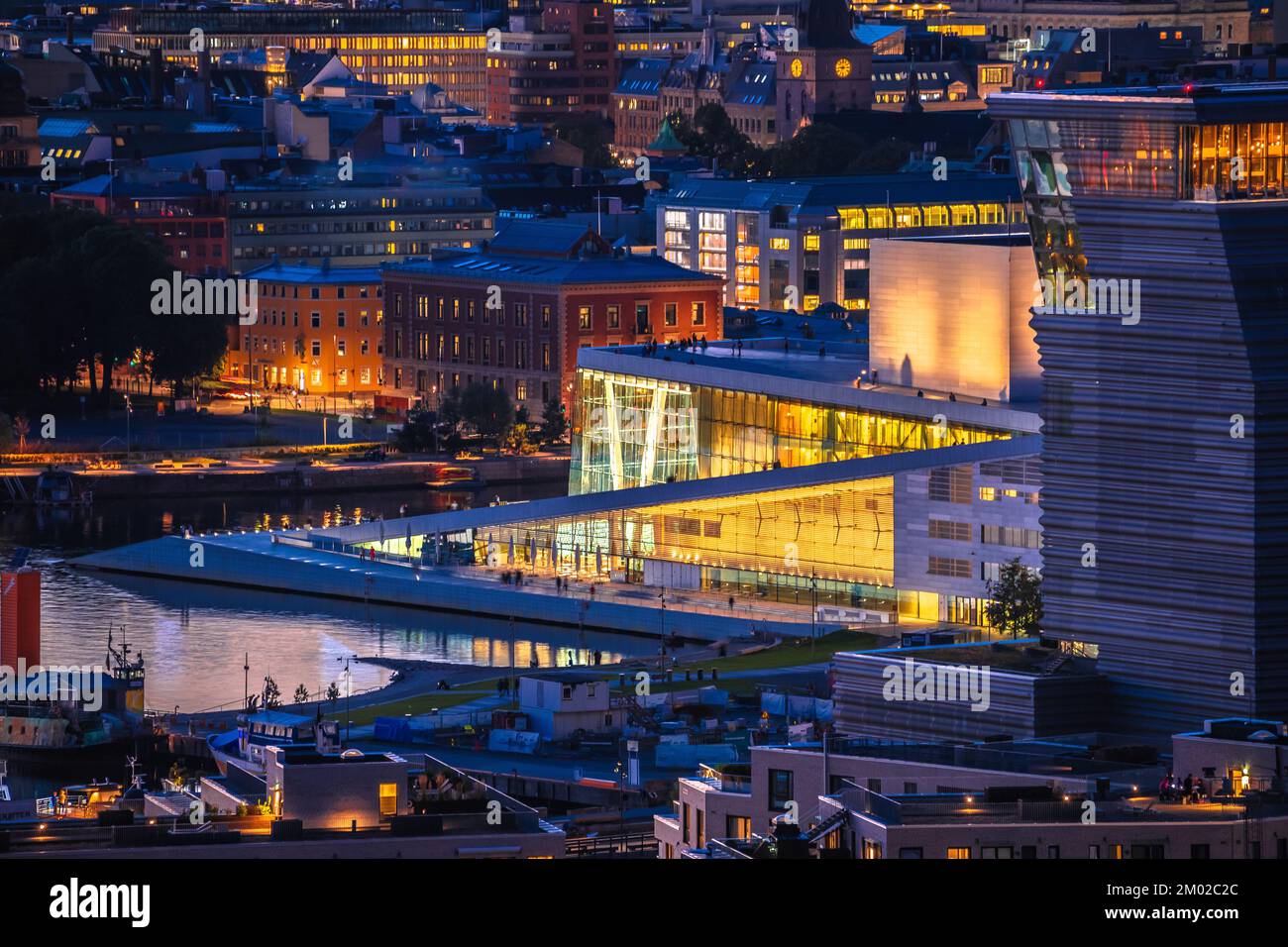 Oslo Opera house and city center modern architecture evening view, capital of Norway Stock Photo